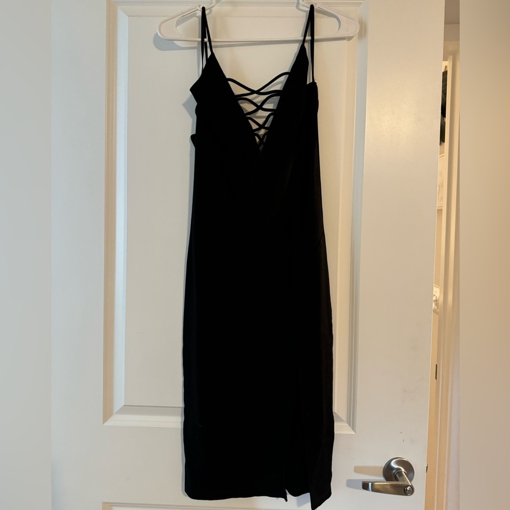 Tight black dress, just below knee length, M/L